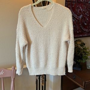 Off white sweater says large but more of a medium